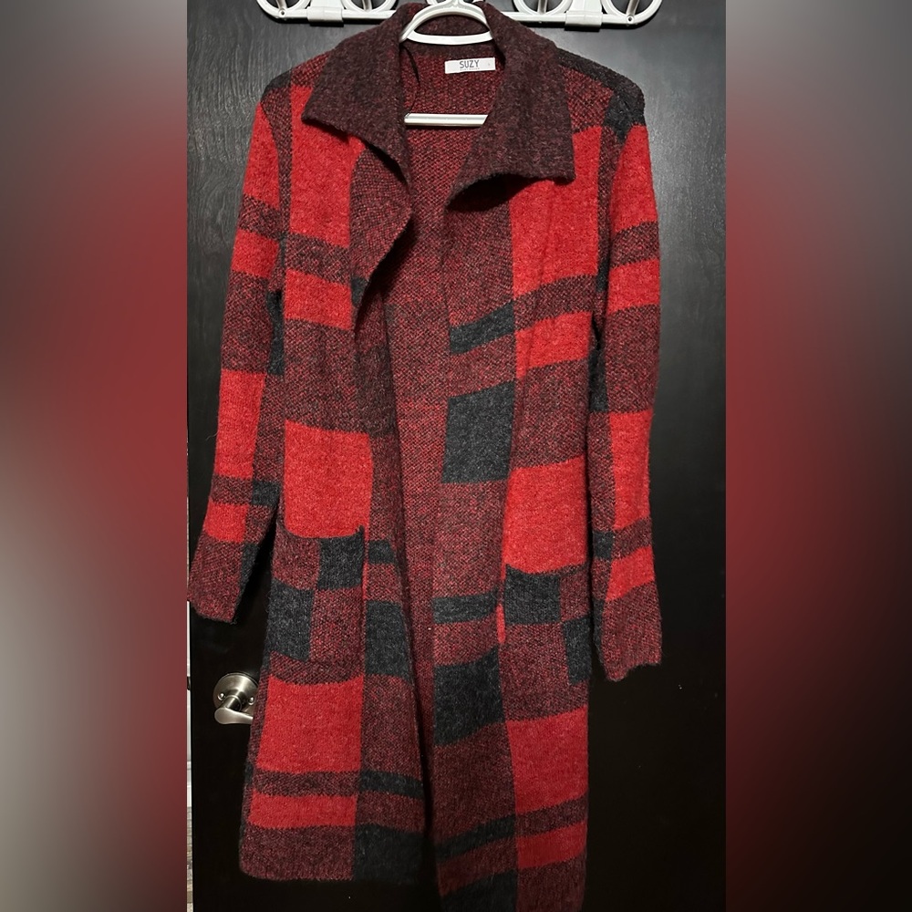 This cosy sweater is by Suzy Sheir, extra small